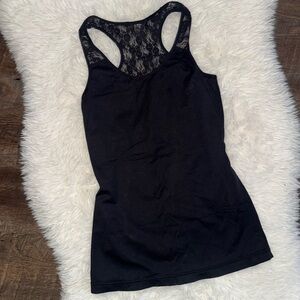 Elegant Black Sleeveless Top with Floral Design